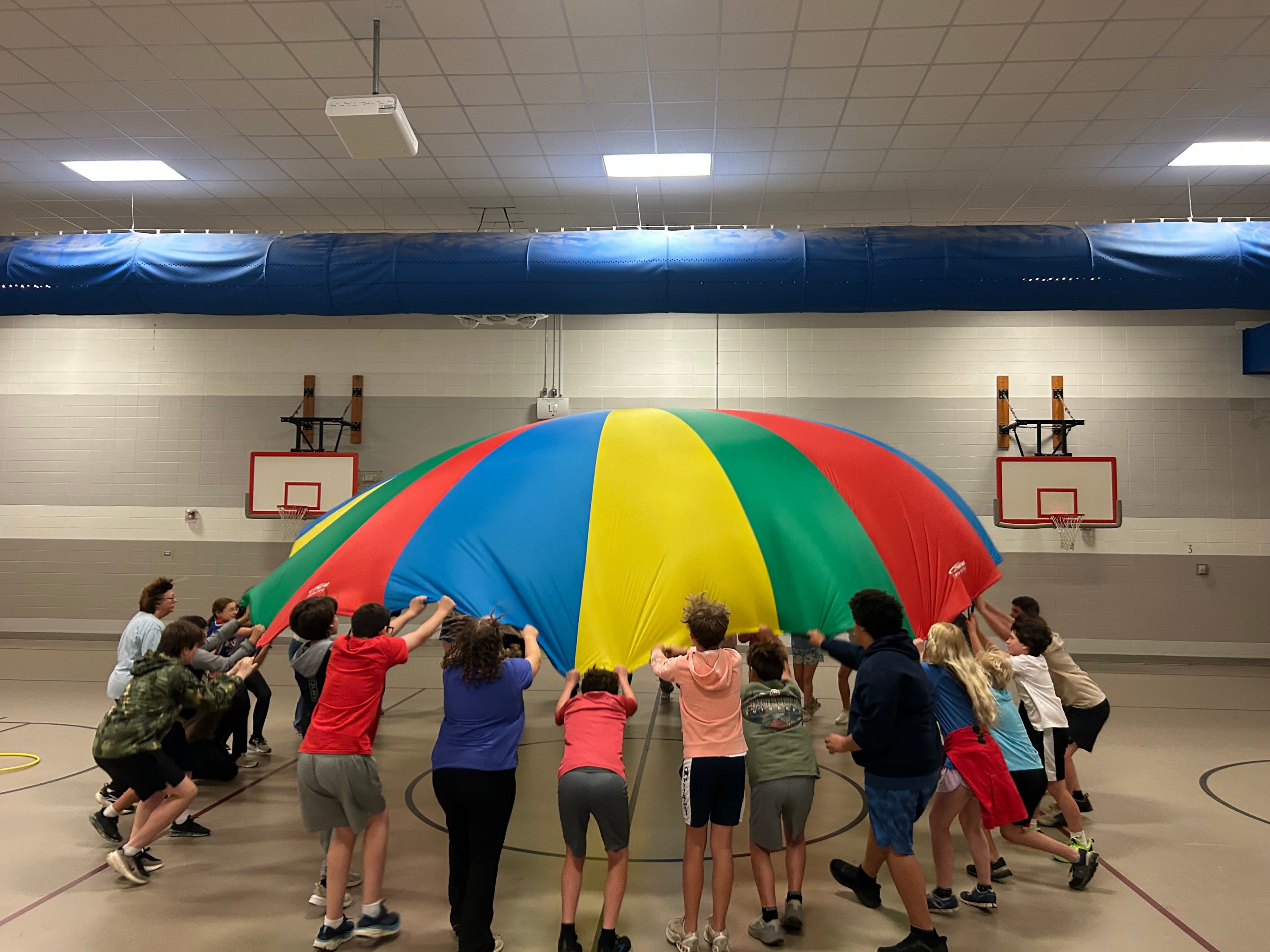 Students playing in gym class